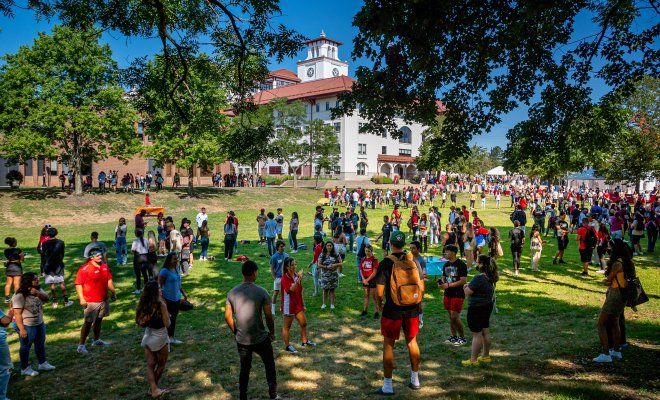 This shows a group of students gathering on Montclair's campus.