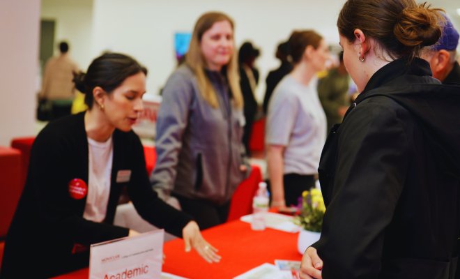 Academic advisor speaking to an accepted student at the College of Communication and Media at Montclair State University.