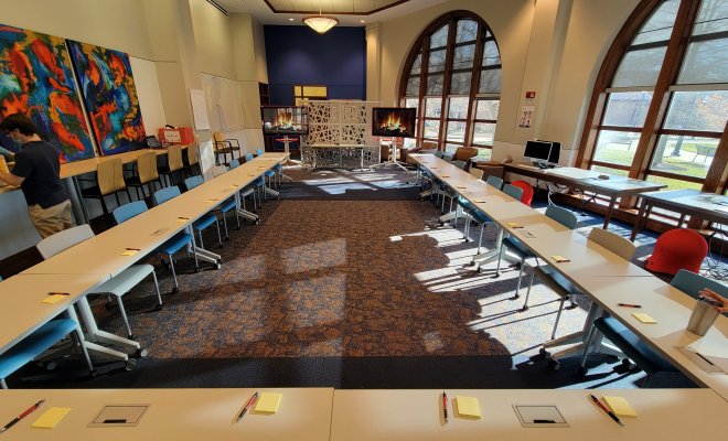Open space with desks arranged in a rectangle 