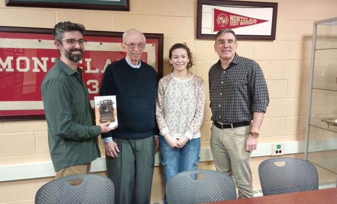 Left to right: Professor Jeffrey Gonzalez, Leon Zimmerman '59, Camille Zimmerman '27 (Leon's granddaughter), Archivist Paul Martinez