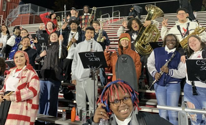 The Pep Band in the stands of a football game