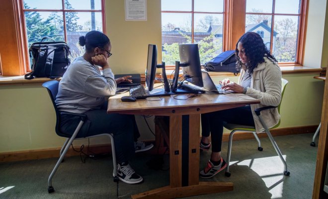 two students sitting at computers