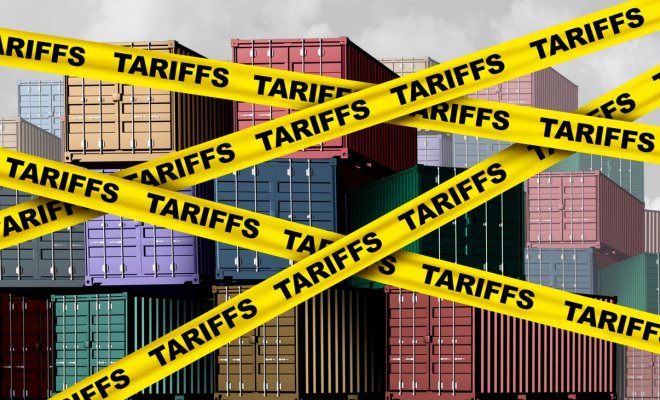 Shipping containers with yellow tariff tape