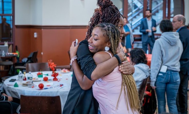 Brielle Allen, Supplemental Instruction Mentor, and Kayla Brown, student, express their gratitude to each other.