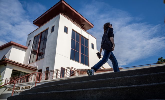 Student talking up stairs 