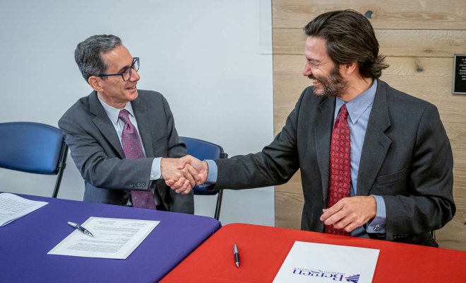President Koppell shaking hands with Bergen County Community College President Dr. Eric M. Friedman