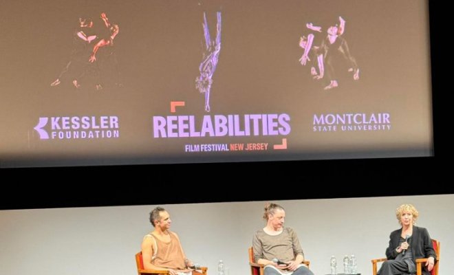 Dancers Nico Gonzales and Henry Holmes converse with Heidi Latsky during "Who Am I Now?" on October 30, 2025
