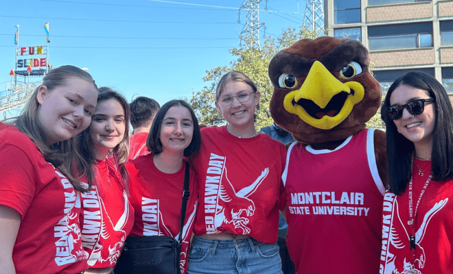 Five Female Inbound Exchange Students with Rocky Mascot Red Hawk Day Fall 2024