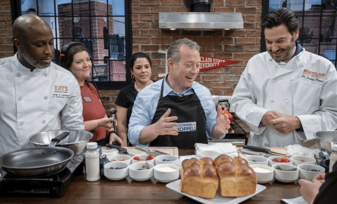 President Koppell on set of Cooking with Koppell alongside crew