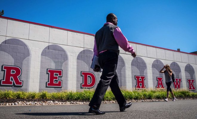 Individuals walking on Montclair campus