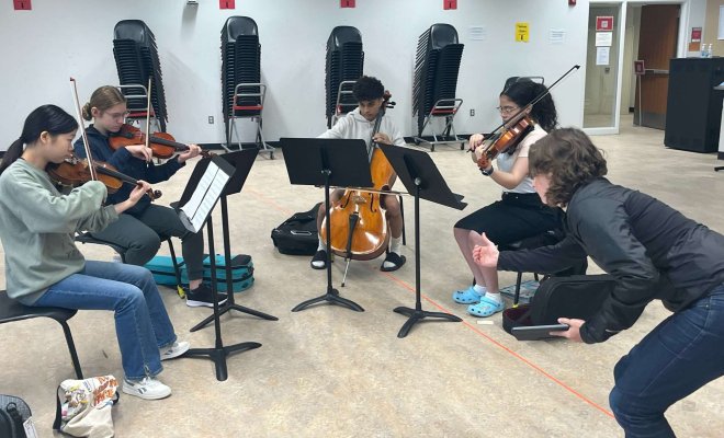 Cali Summer Strings youth quartet being coached by instructor