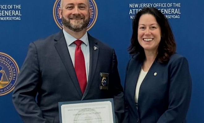 Chief Timothy Fox and NJ Attorney General Jennifer Davenport pose for a photo