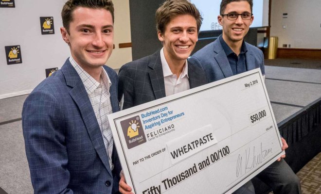 From left, George Garcia, Jacob Gilbert and Matthew Szot celebrate their $50,000 first-place prize in the BulbHead.com Inventors Day for Aspiring Entrepreneurs.