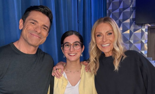 Teresa Gomez poses for photo with Kelly Ripa and Mark Consuelos.
