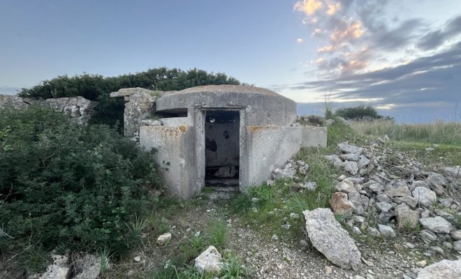 A WW2-era concrete bunker on an Italian beach