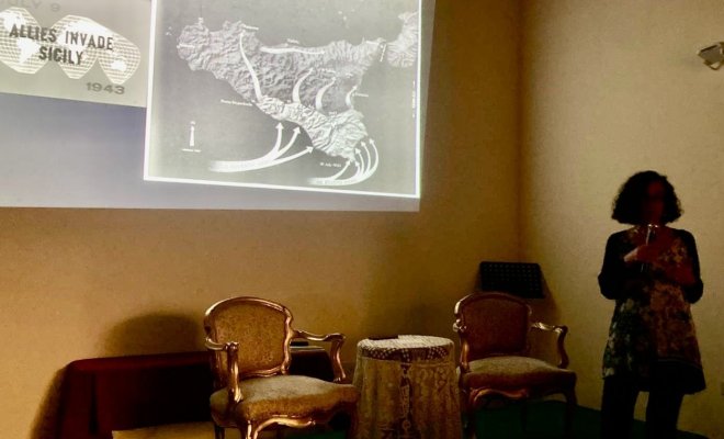 Dr. Teresa Fiore gives a presentation to an audience