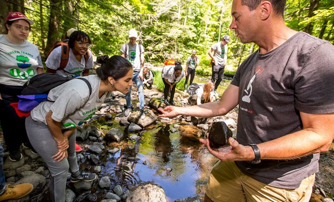 SOC Field Trip looking at creatures caught in stream