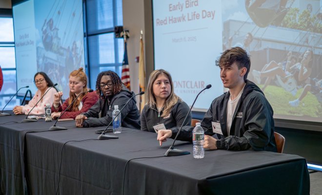 Students on stage at Early Bird day admissions at Montclair State University.