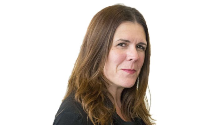 Headshot of Enza Antenos