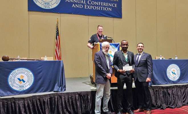 Odera Umeh receiving John J. LaGrosa Award at NJWEA conference