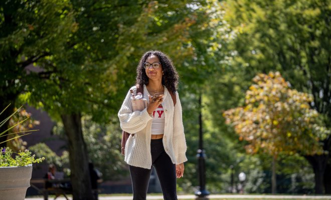Student walking on campus.