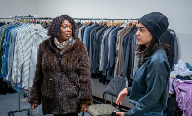 two people standing in rocky's closet
