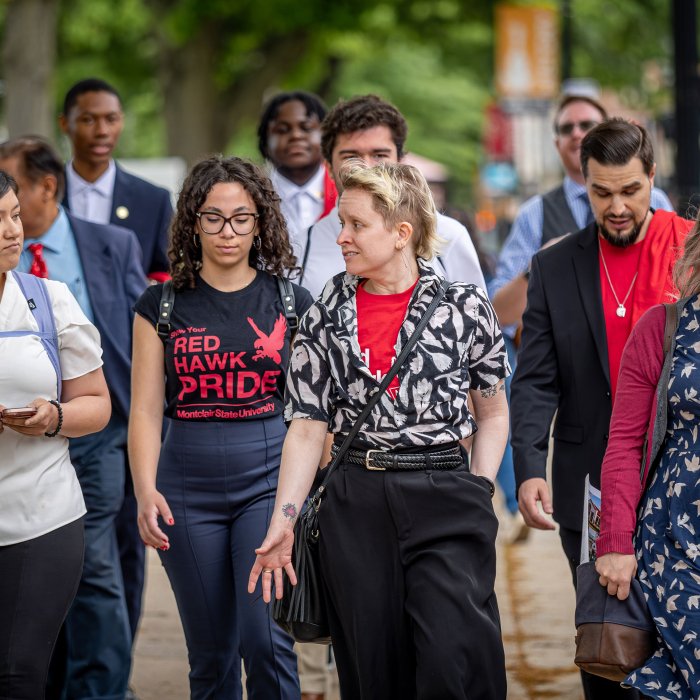 A group of people walk together.