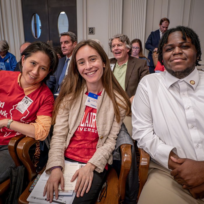 Students attend a budget hearing.