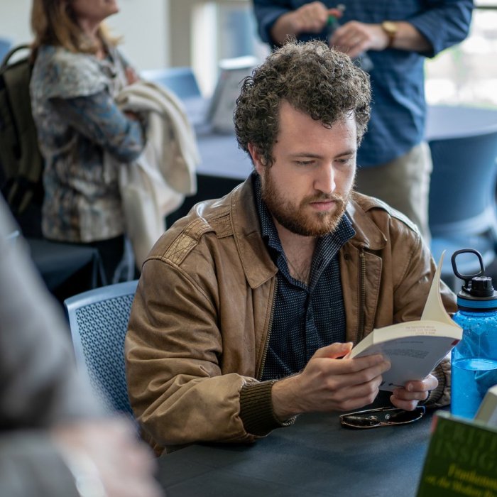 man reading a book 