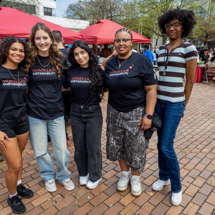 Five interns from the Office of Sustainability standing together for a group picture.