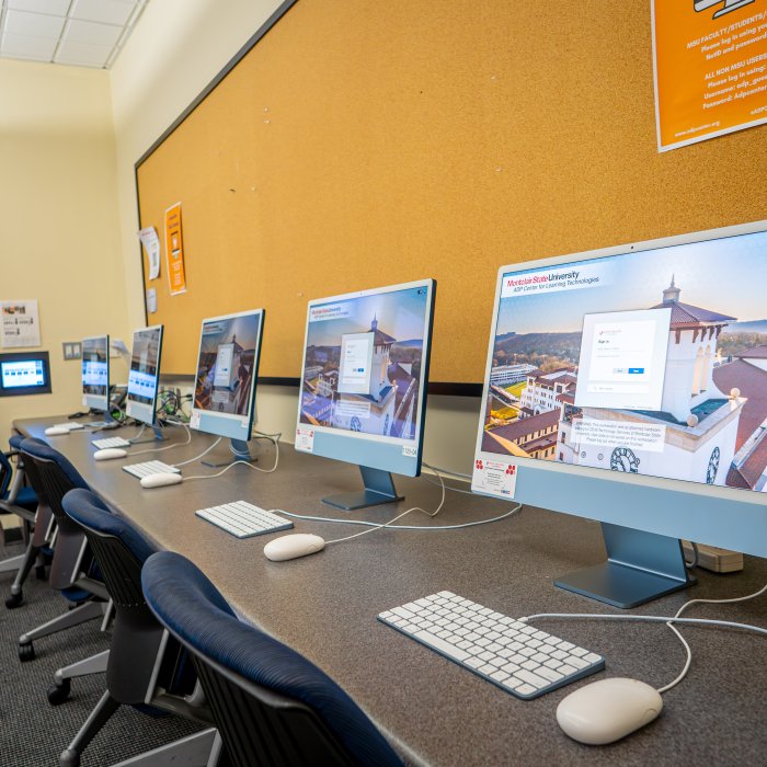 Close up of computers in classroom 