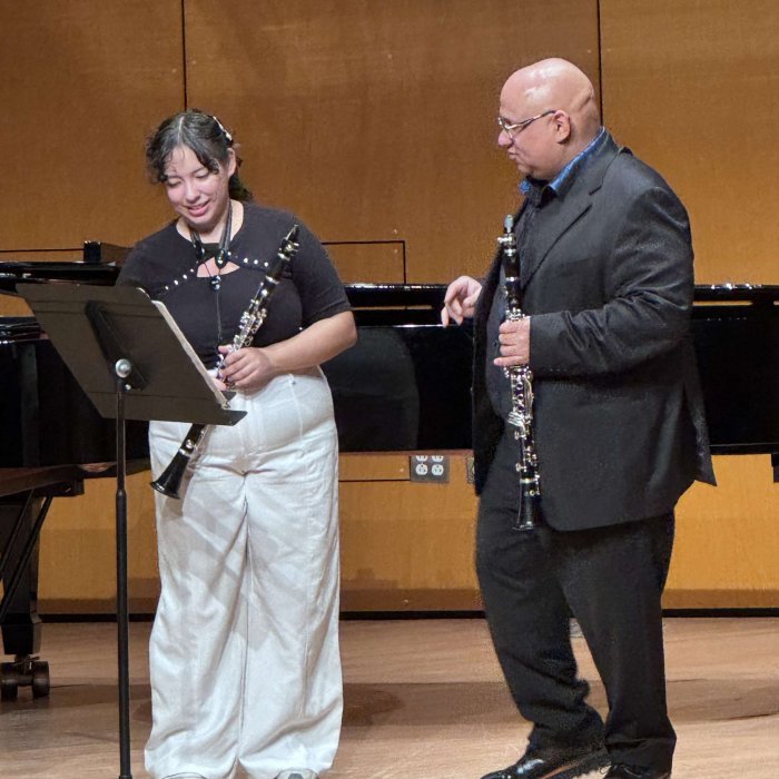 Clarinet Day attendee on stage with guest artist