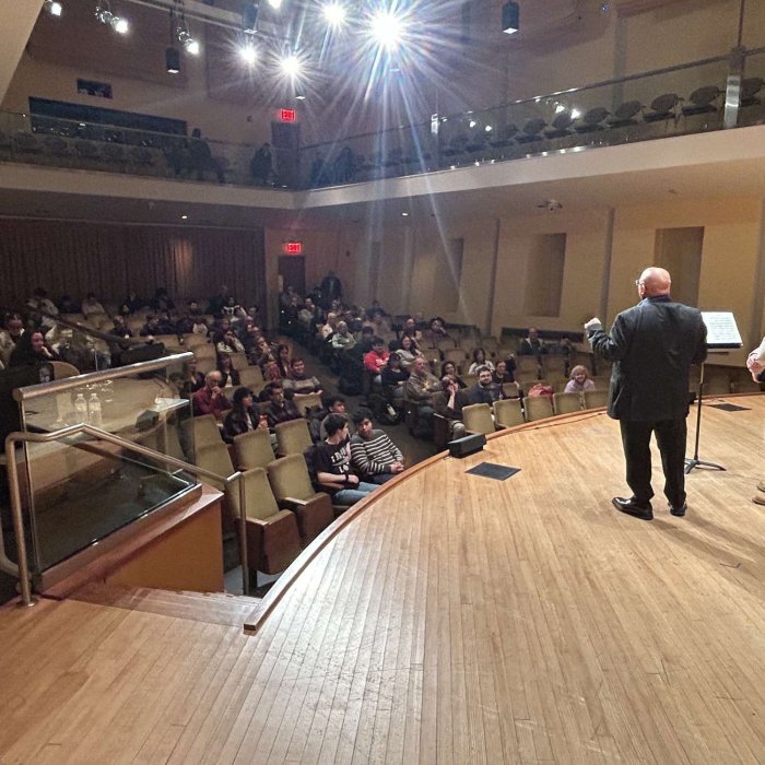 Clarinet Day attendee on stage with guest artist