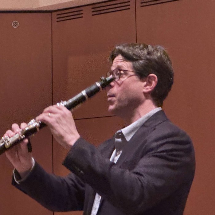 Professor Benjamin Baron with clarinet on stage