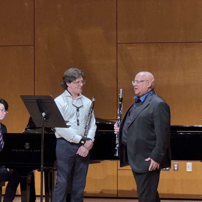 Clarinet Day attendee on stage with guest artist