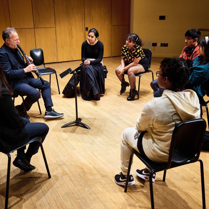clarinet Pathways students on stage with clarinetest David Krakauer
