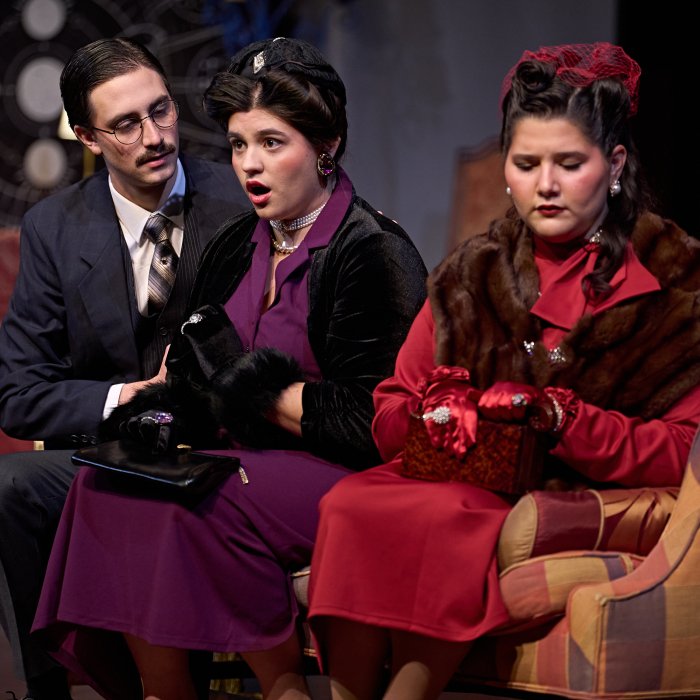 3 Opera Performers on stage performing The Medium
