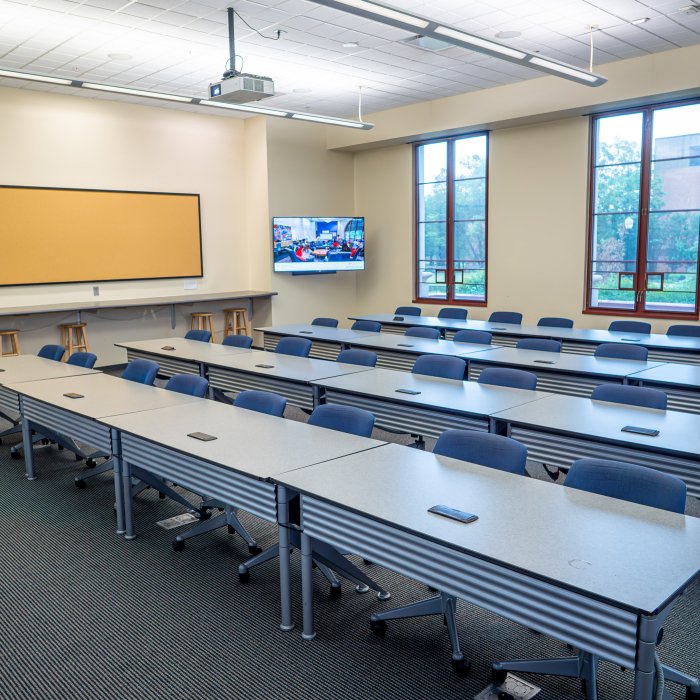 Empty classroom with monitor in corner 