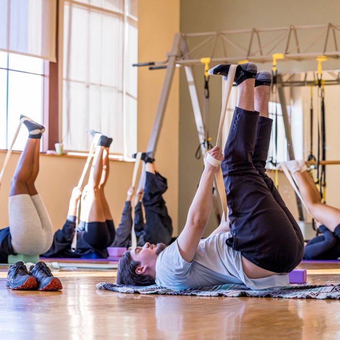 group of students taking a yoga class