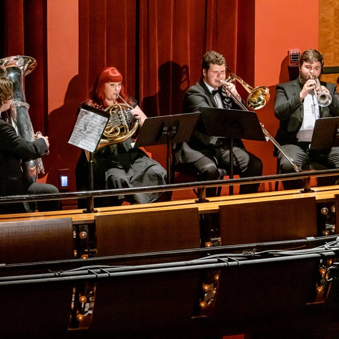 Brass ensemble on stage in Kasser Theater