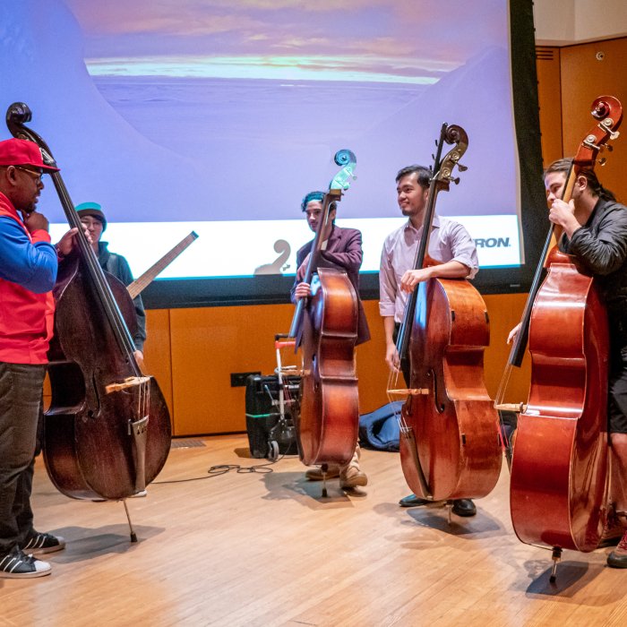 Christian McBride on stage with Cali bass students in masterclass