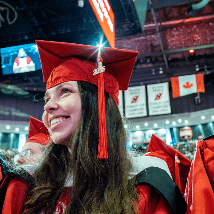 A picture of a student at commencement.