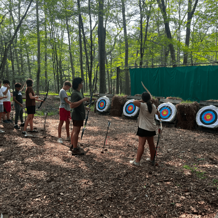 Stokers campers doing archery 