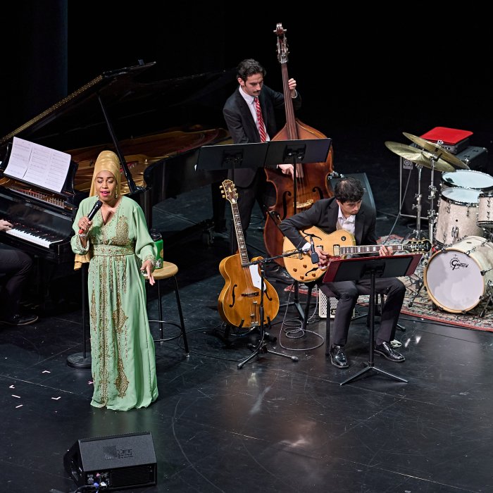 Jazz combo on stage with Jazzmeia Horn