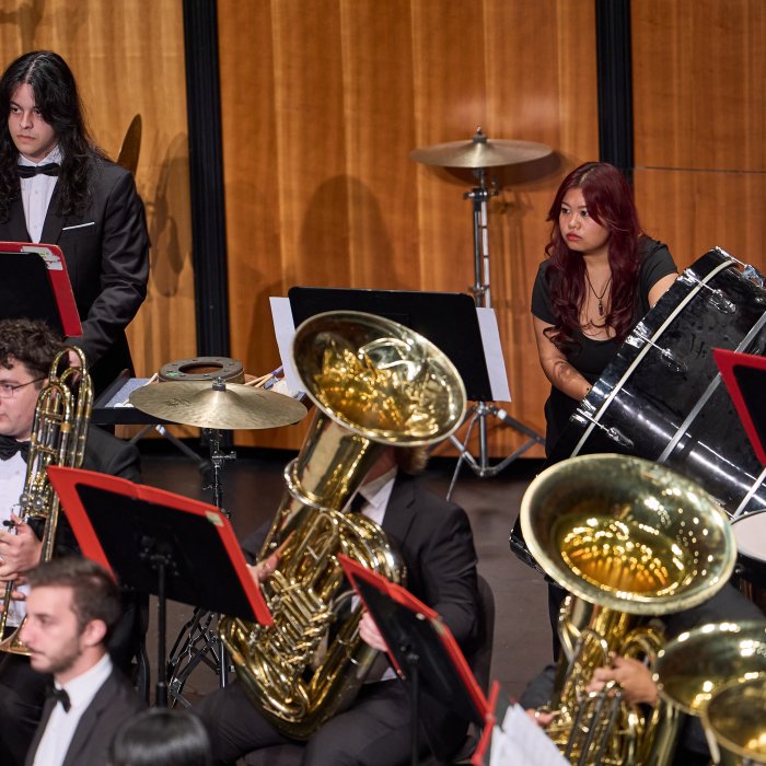 Tuba students on stage in Kaleidoscope performance with Wind Symphony
