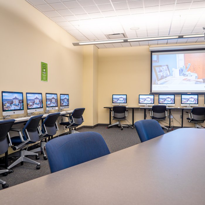 Computer lab with computers lining walls