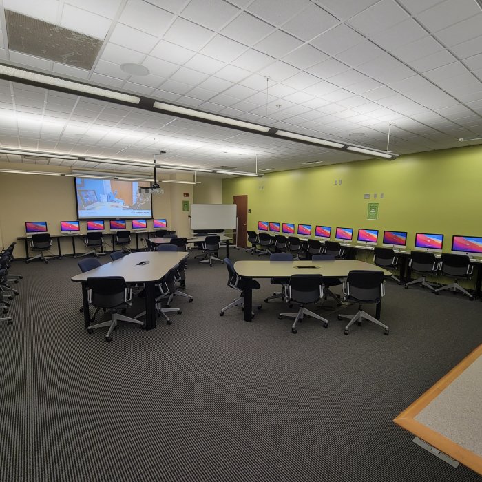 Computer lab with computers lining walls