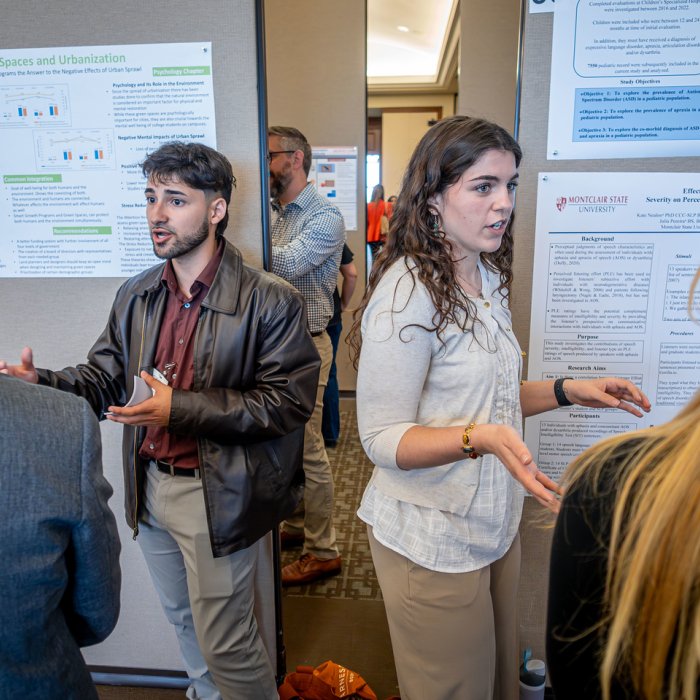 Students presenting posters