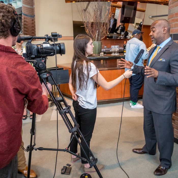 Local News interviewing another person.