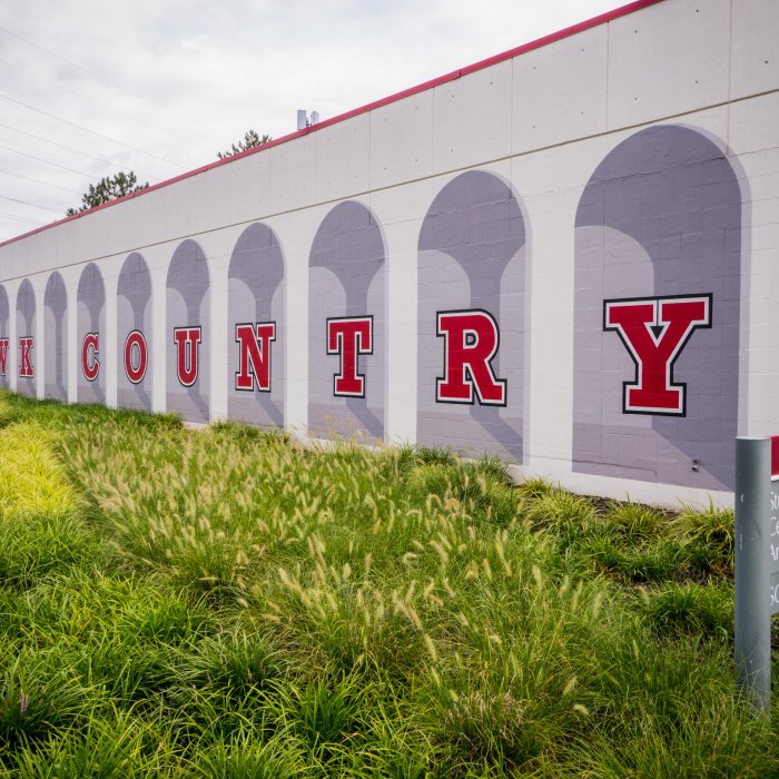 Red Hawk Country mural on Student Center Annex